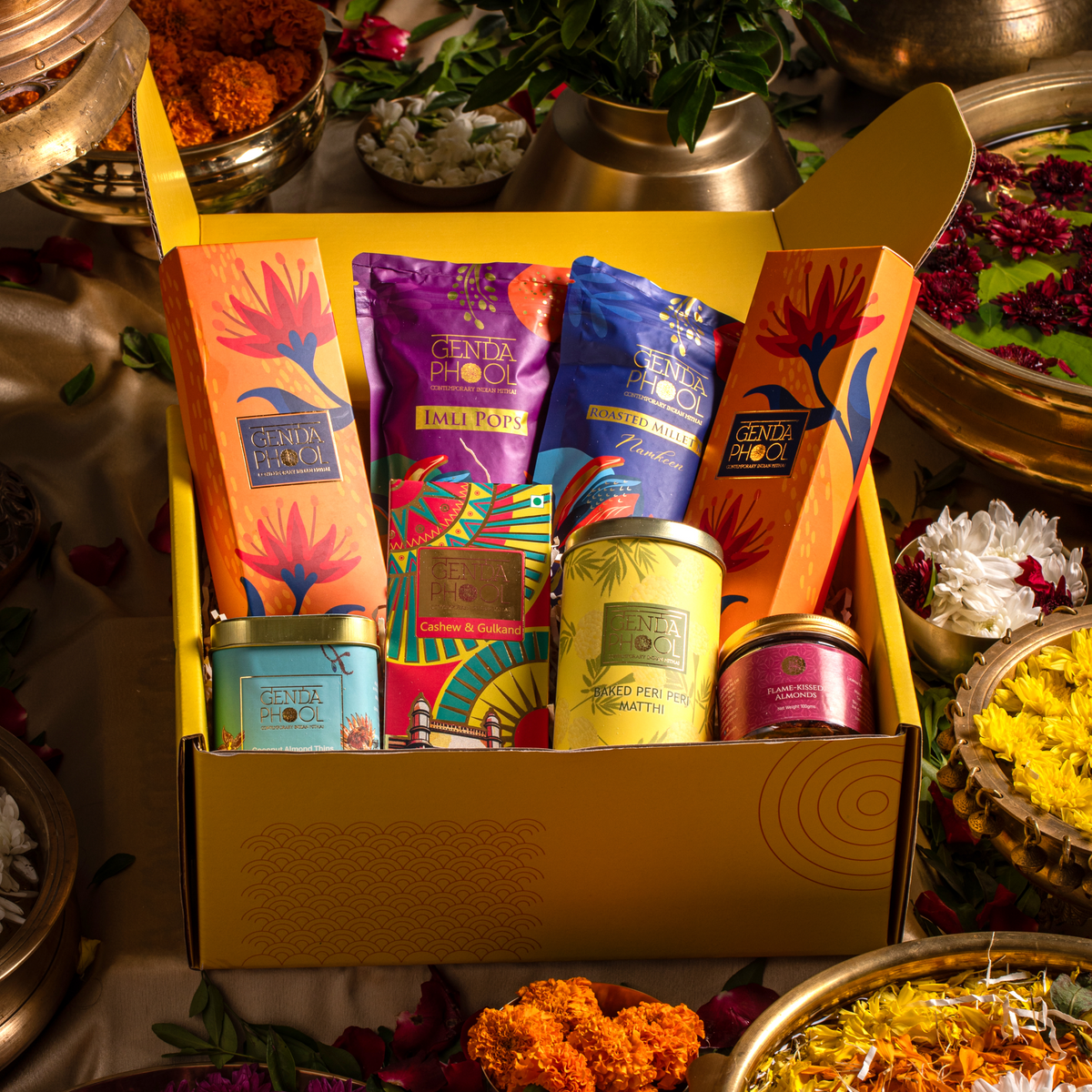 Marriage anniversary hamper of mithai and snacks for guests